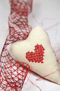 Embroidered heart and ribbon
